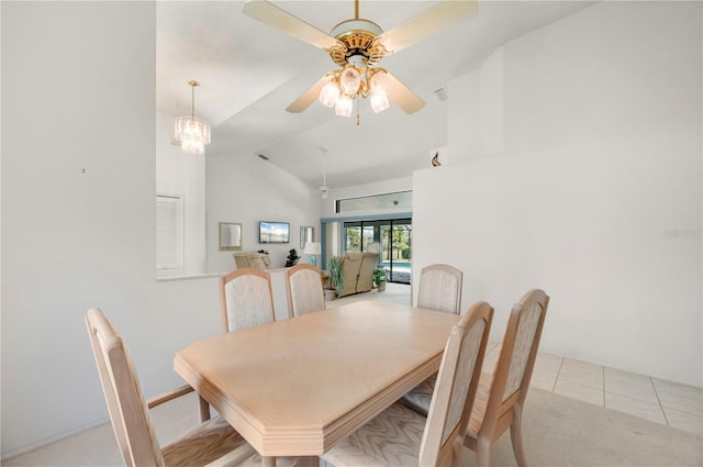 25371 Paladin Ln, Punta Gorda, FL 33983 - dining room with a ceiling fan, high vaulted ceiling, carpet floors, and tile patterned floors