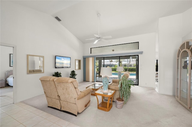 25371 Paladin Ln, Punta Gorda, FL 33983 - living room with high vaulted ceiling, light colored carpet, and a ceiling fan