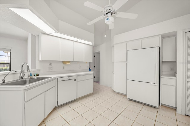 25371 Paladin Ln, Punta Gorda, FL 33983 - kitchen with white appliances, a sink, light countertops, ceiling fan, and white cabinets