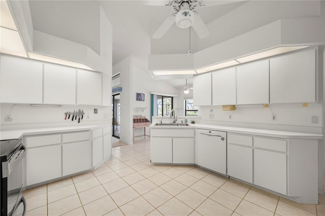 25371 Paladin Ln, Punta Gorda, FL 33983 - kitchen with dishwasher, electric range, a sink, ceiling fan, and white cabinets