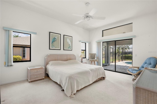 25371 Paladin Ln, Punta Gorda, FL 33983 - bedroom featuring multiple windows, light carpet, and access to outside