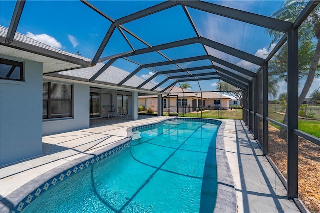 25371 Paladin Ln, Punta Gorda, FL 33983 - outdoor pool featuring a patio and glass enclosure
