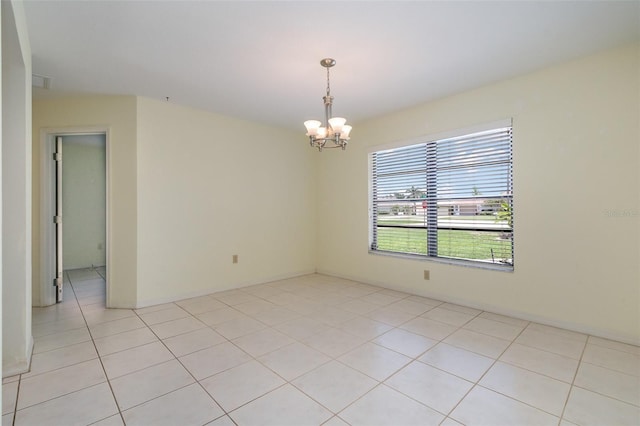 1472 Oriel Ct, Punta Gorda, FL 33983 - unfurnished room featuring a chandelier and light tile patterned floors