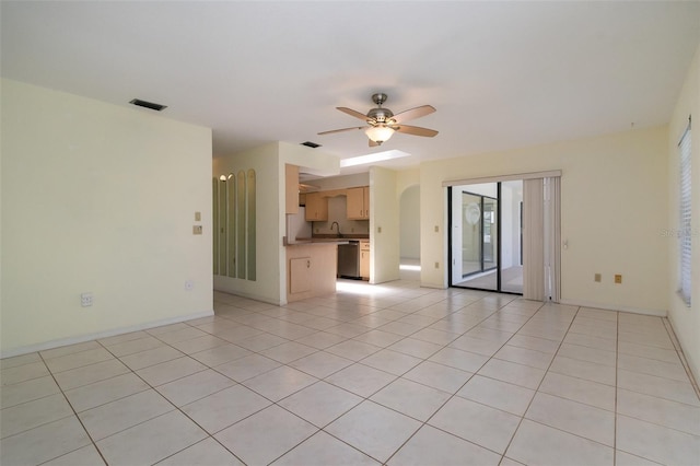 1472 Oriel Ct, Punta Gorda, FL 33983 - unfurnished living room featuring ceiling fan, light tile patterned floors, a sink, and baseboards