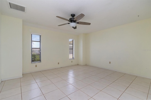 1472 Oriel Ct, Punta Gorda, FL 33983 - spare room featuring a ceiling fan and light tile patterned floors