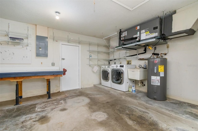 1472 Oriel Ct, Punta Gorda, FL 33983 - garage with water heater, washing machine and dryer, electric panel, a sink, and a workshop area