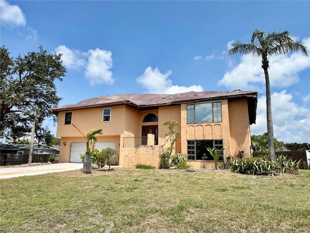 1611 Robbins Rd, Nokomis, FL 34275 - view of front of home featuring stucco siding, driveway, and a garage