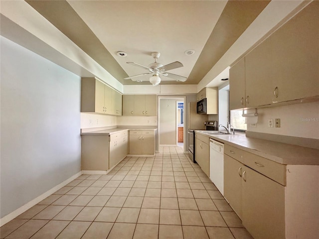 1611 Robbins Rd, Nokomis, FL 34275 - kitchen featuring dishwasher, range, a sink, a ceiling fan, and light countertops