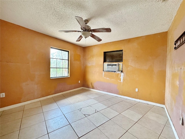 1611 Robbins Rd, Nokomis, FL 34275 - unfurnished room featuring a textured ceiling, a ceiling fan, light tile patterned floors, baseboards, and cooling unit