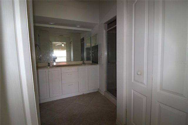 3803 Albacete Cir Unit 64, Punta Gorda, FL 33950 - full bathroom with tile patterned floors, double vanity, and a shower stall