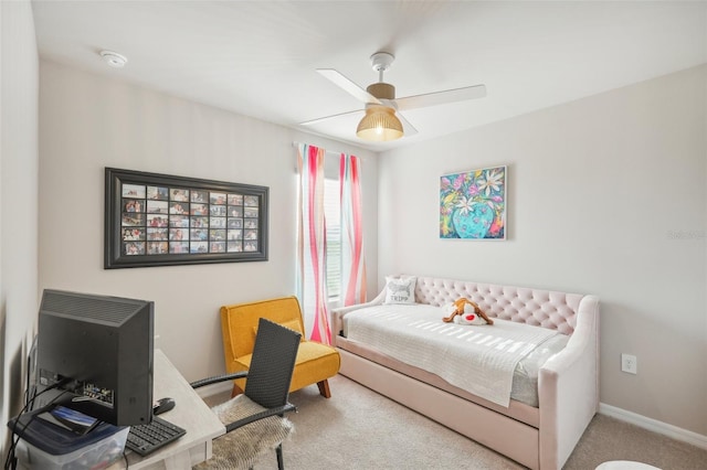 bedroom featuring carpet, a ceiling fan, and baseboards