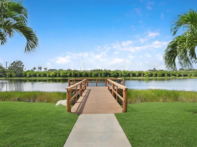 13281 Whitehaven Ln Unit 404, Fort Myers, FL 33966 - dock area with a water view and a yard