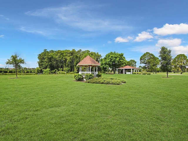 13281 Whitehaven Ln Unit 404, Fort Myers, FL 33966 - view of green lawn featuring a gazebo