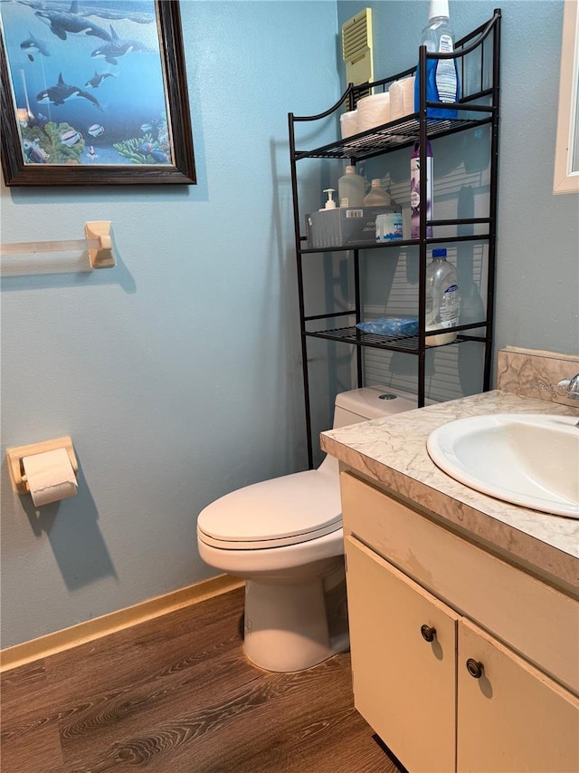 21260 Brinson Ave Unit 110, Port Charlotte, FL 33952 - half bath with wood finished floors and vanity