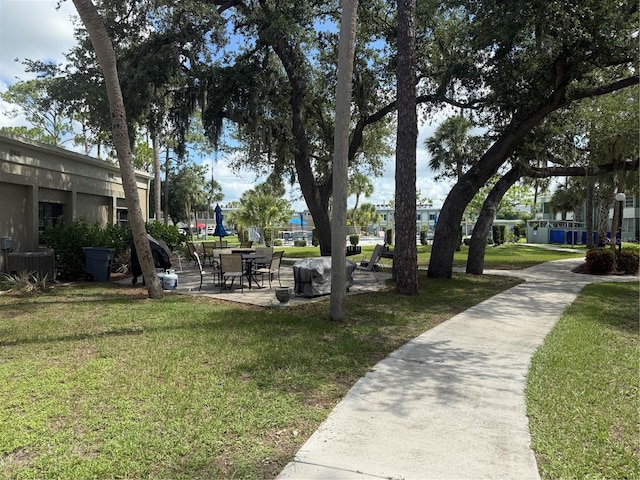 21260 Brinson Ave Unit 110, Port Charlotte, FL 33952 - view of home's community featuring a yard