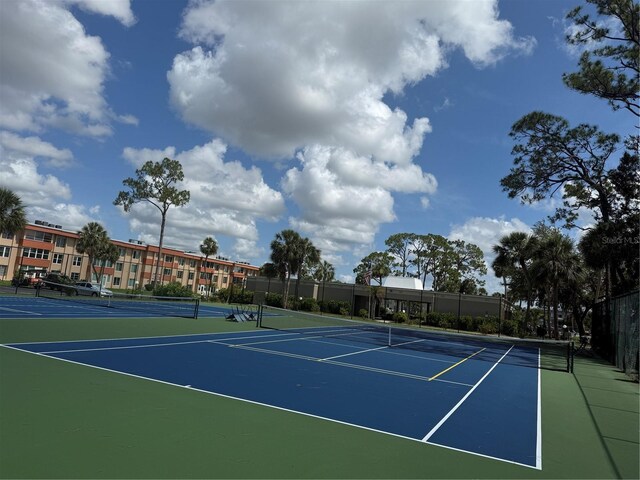 21260 Brinson Ave Unit 110, Port Charlotte, FL 33952 - view of tennis court with community basketball court