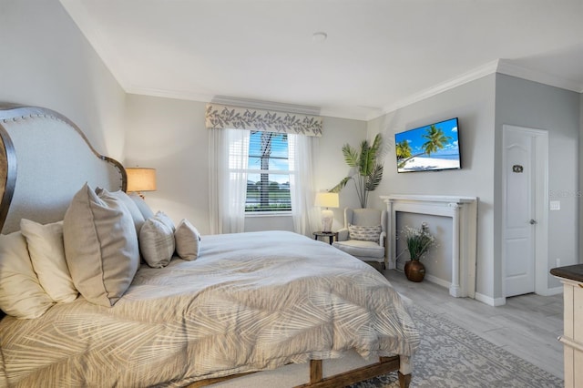 43249 Treadway Dr, Punta Gorda, FL 33982 - bedroom with crown molding, light wood-style floors, and baseboards