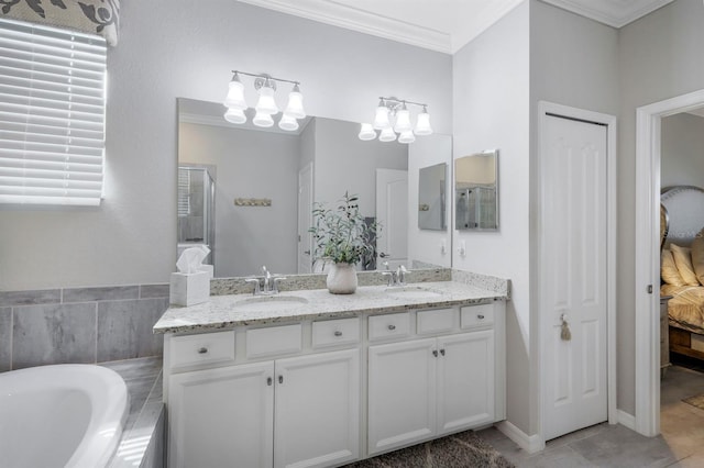 43249 Treadway Dr, Punta Gorda, FL 33982 - ensuite bathroom with double vanity, a bath, a chandelier, ornamental molding, and a shower with shower door