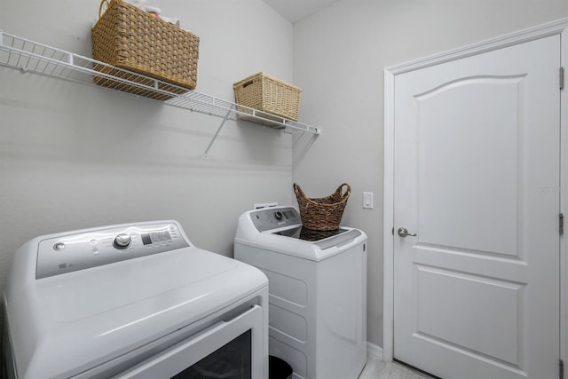 43249 Treadway Dr, Punta Gorda, FL 33982 - laundry area featuring washing machine and dryer