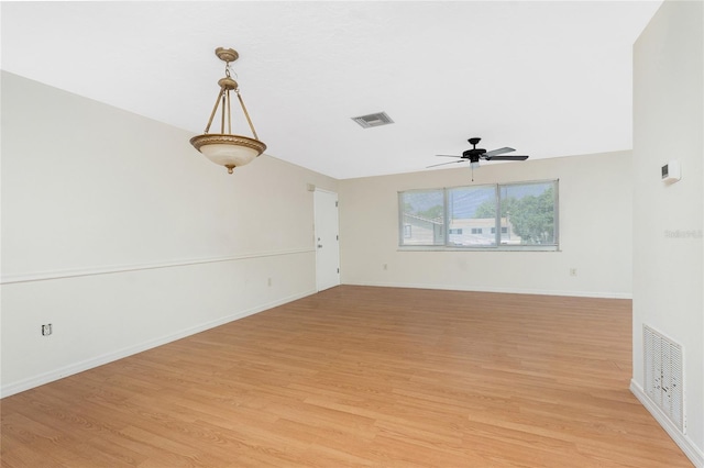 22481 Westchester Blvd Unit B47, Punta Gorda, FL 33980 - empty room featuring ceiling fan, light wood-type flooring, and baseboards