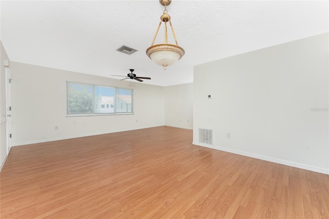 22481 Westchester Blvd Unit B47, Punta Gorda, FL 33980 - empty room featuring light wood-type flooring, baseboards, and ceiling fan