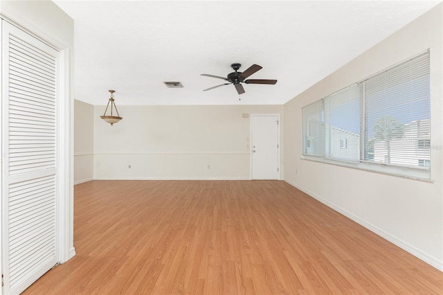 22481 Westchester Blvd Unit B47, Punta Gorda, FL 33980 - unfurnished room featuring light wood-style floors, a ceiling fan, and baseboards