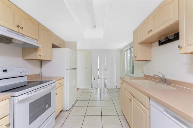 22481 Westchester Blvd Unit B47, Punta Gorda, FL 33980 - kitchen featuring white appliances, under cabinet range hood, a sink, light countertops, and light tile patterned floors