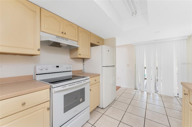 22481 Westchester Blvd Unit B47, Punta Gorda, FL 33980 - kitchen featuring white appliances, under cabinet range hood, and light countertops