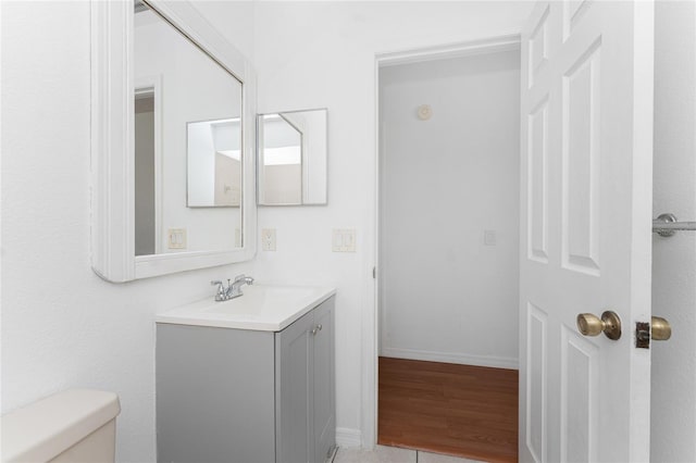 22481 Westchester Blvd Unit B47, Punta Gorda, FL 33980 - bathroom featuring vanity, toilet, and wood finished floors