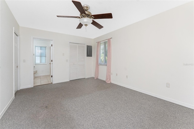 22481 Westchester Blvd Unit B47, Punta Gorda, FL 33980 - unfurnished bedroom featuring carpet, multiple windows, and baseboards