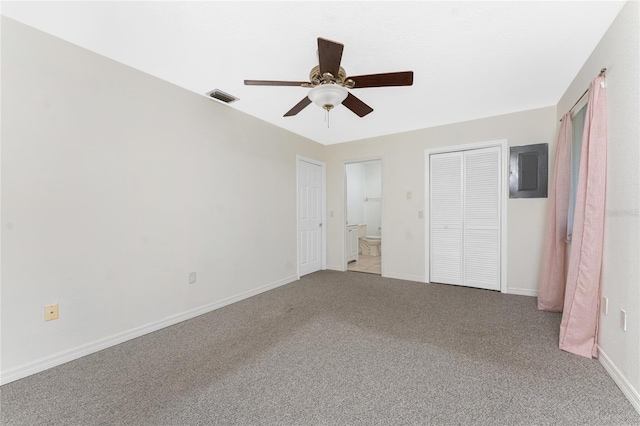 22481 Westchester Blvd Unit B47, Punta Gorda, FL 33980 - unfurnished bedroom with electric panel, carpet, connected bathroom, baseboards, and ceiling fan
