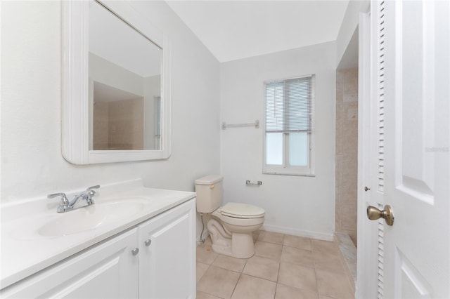 22481 Westchester Blvd Unit B47, Punta Gorda, FL 33980 - bathroom featuring vanity, toilet, tile patterned floors, and tiled shower