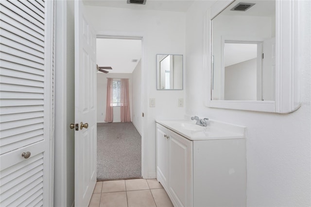22481 Westchester Blvd Unit B47, Punta Gorda, FL 33980 - bathroom featuring vanity, tile patterned flooring, and a ceiling fan