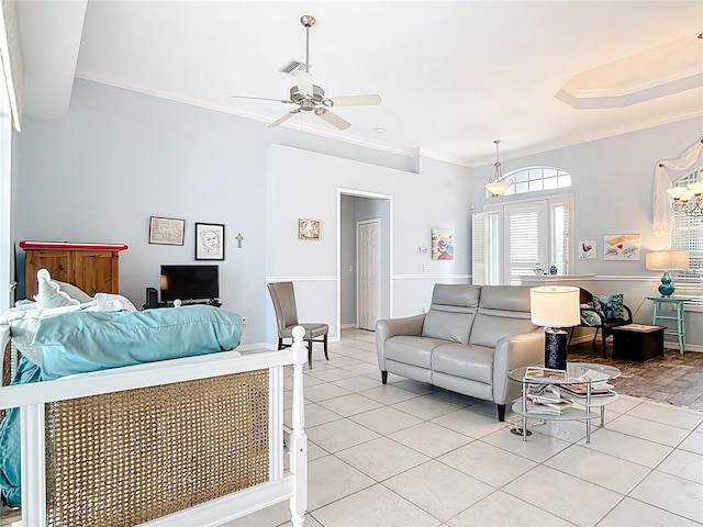 1007 Comstock St, Port Charlotte, FL 33952 - living area with ornamental molding, light tile patterned flooring, and ceiling fan