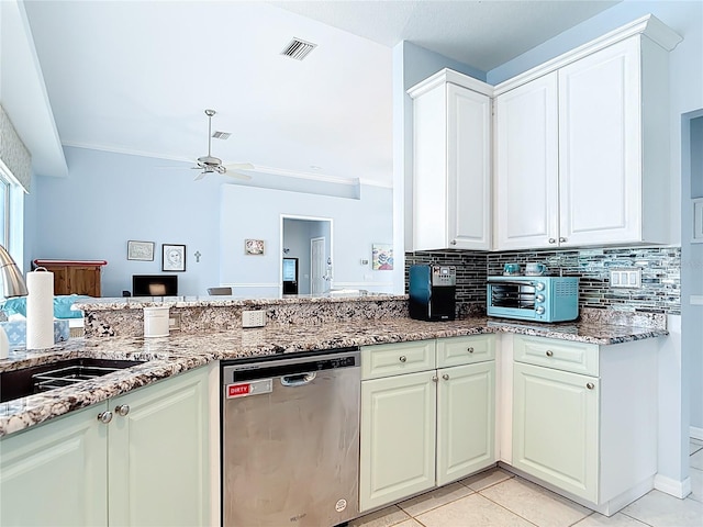 1007 Comstock St, Port Charlotte, FL 33952 - kitchen featuring dishwasher, a sink, a ceiling fan, light stone counters, and light tile patterned flooring