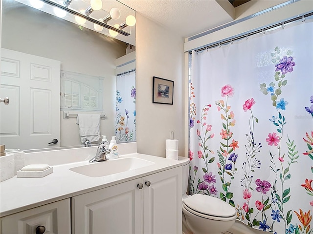 1007 Comstock St, Port Charlotte, FL 33952 - full bathroom with vanity, toilet, curtained shower, and a textured ceiling