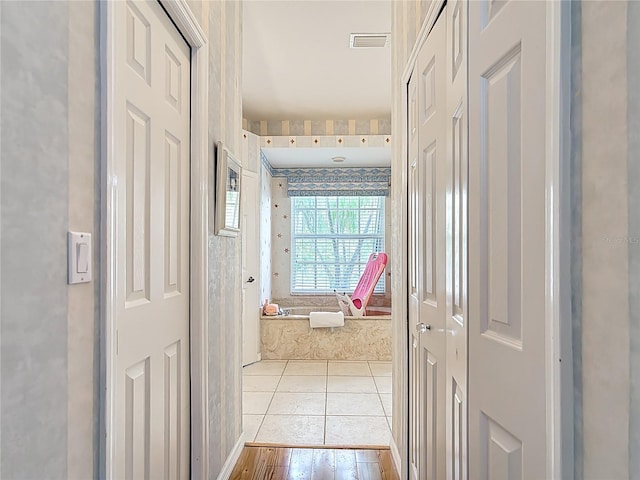 1007 Comstock St, Port Charlotte, FL 33952 - hallway featuring wood finished floors