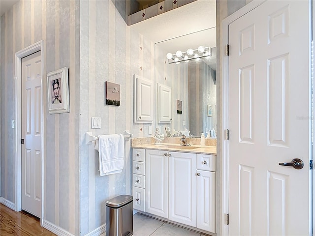 1007 Comstock St, Port Charlotte, FL 33952 - bathroom featuring vanity and baseboards
