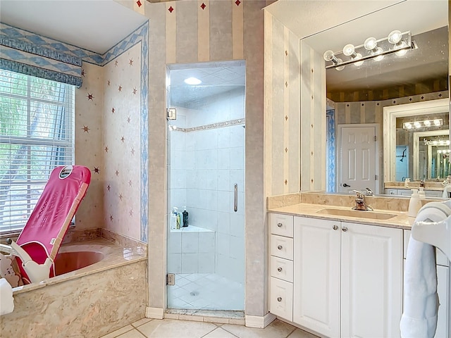 1007 Comstock St, Port Charlotte, FL 33952 - bathroom with wallpapered walls, vanity, a bath, a shower stall, and tile patterned flooring