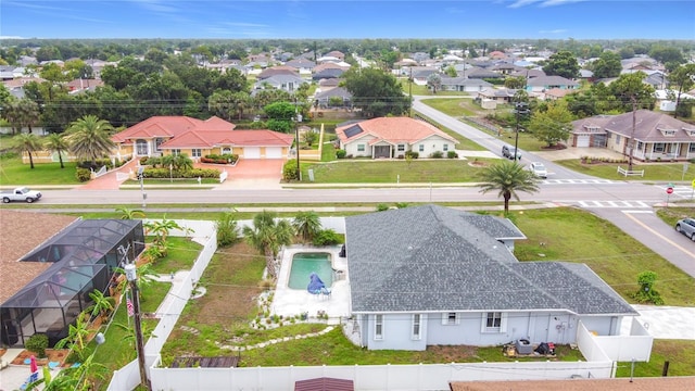 1007 Comstock St, Port Charlotte, FL 33952 - aerial perspective of suburban area featuring a pool area