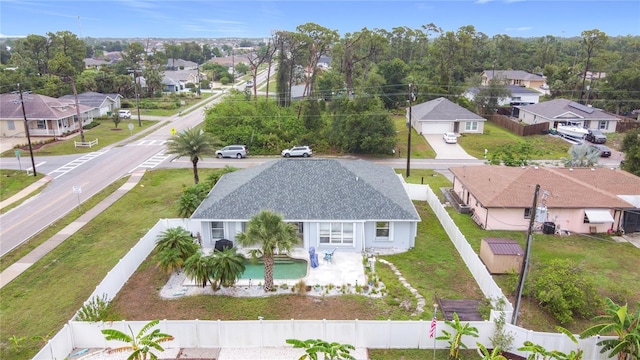1007 Comstock St, Port Charlotte, FL 33952 - aerial view of residential area featuring a pool area