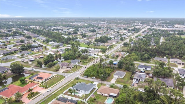 1007 Comstock St, Port Charlotte, FL 33952 - aerial view of property's location featuring nearby suburban area and a large body of water