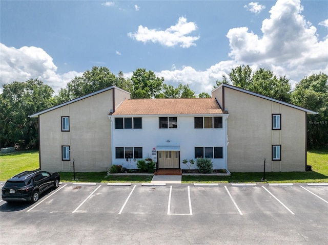 22481 Westchester Blvd Unit B48, Punta Gorda, FL 33980 - view of building exterior featuring uncovered parking