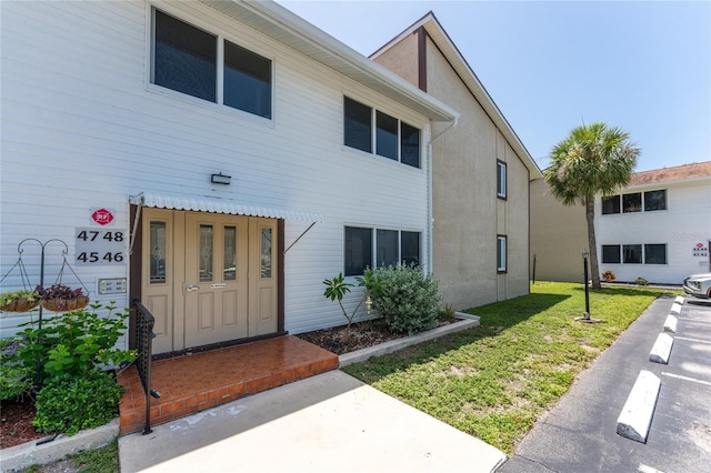 22481 Westchester Blvd Unit B48, Punta Gorda, FL 33980 - view of front of house featuring a front yard and stucco siding