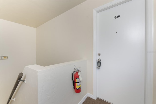 22481 Westchester Blvd Unit B48, Punta Gorda, FL 33980 - laundry area featuring carpet and baseboards