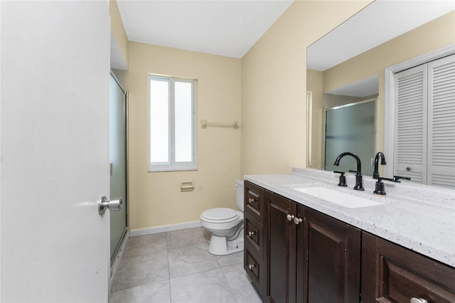 22481 Westchester Blvd Unit B48, Punta Gorda, FL 33980 - full bath with vanity, a shower stall, toilet, baseboards, and tile patterned flooring
