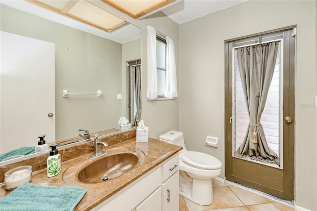 2160 Aqui Esta Dr, Punta Gorda, FL 33950 - bathroom featuring vanity, toilet, and tile patterned flooring