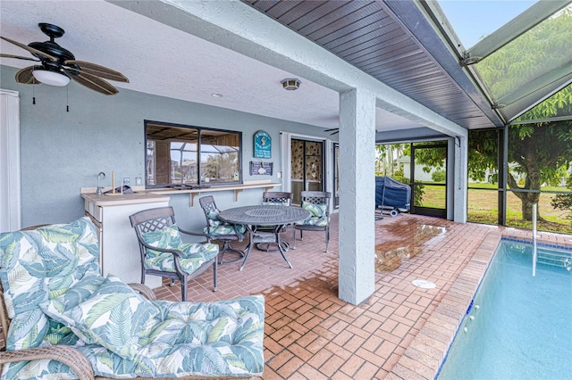 2160 Aqui Esta Dr, Punta Gorda, FL 33950 - view of patio / terrace featuring ceiling fan, an outdoor pool, and glass enclosure