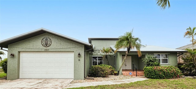 2160 Aqui Esta Dr, Punta Gorda, FL 33950 - single story home with a garage, driveway, and stucco siding