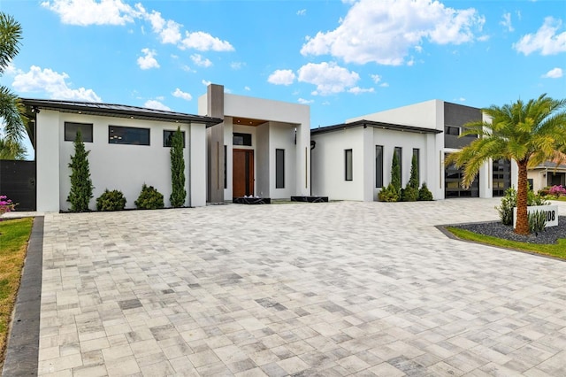 1108 SW 24th St, Cape Coral, FL 33991 - modern home featuring stucco siding